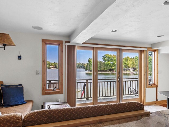 W6538 County Road C, Plymouth, WI 53073 - carpeted bedroom with baseboards and lofted ceiling