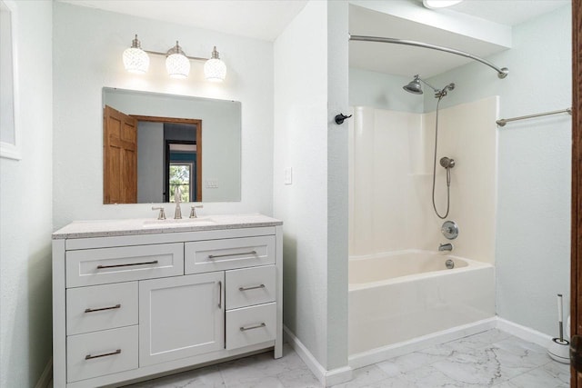 bathroom featuring tub / shower combination and vanity