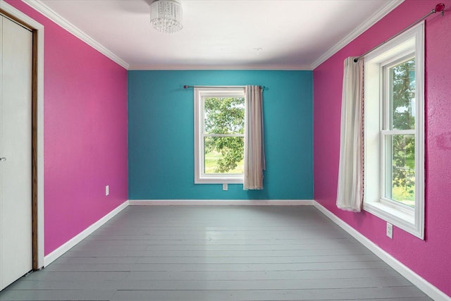 unfurnished room with crown molding and dark hardwood / wood-style floors