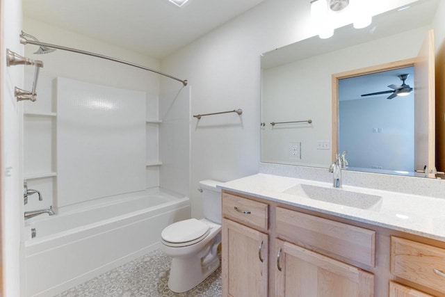 full bathroom featuring vanity, toilet, shower / bathtub combination, and ceiling fan