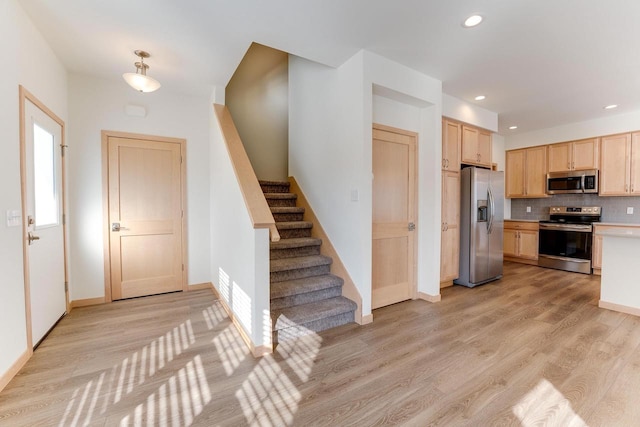 foyer featuring light hardwood / wood-style floors