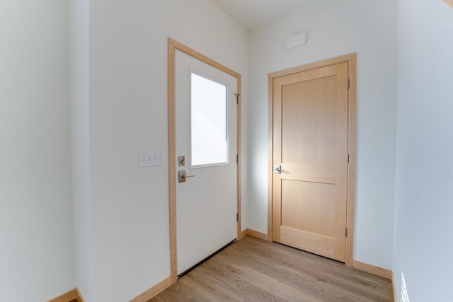 doorway to outside featuring light hardwood / wood-style floors