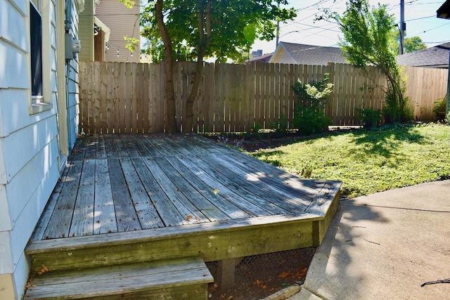 deck featuring a yard