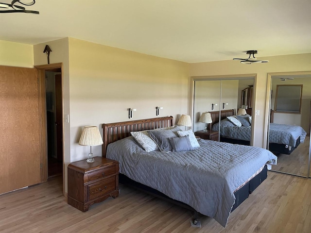 bedroom featuring a closet and hardwood / wood-style flooring