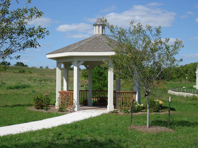 view of community featuring a lawn and a gazebo