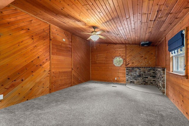 N1802 Shambeau, Waupaca, WI 54981 - unfurnished room with carpet floors, wood ceiling, ceiling fan, and wood walls