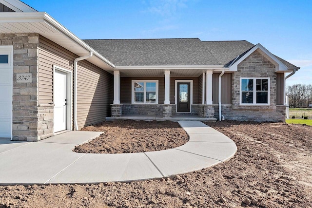 entrance to property with a porch