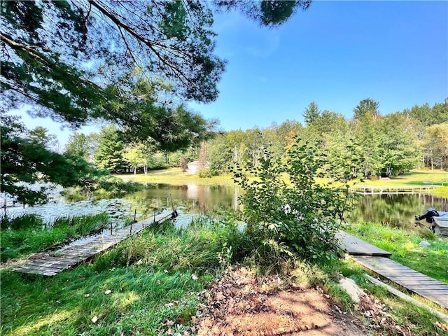 15366 W Reiskies Rd, Hayward, WI 54843 - view of yard featuring a water view and a wooded view