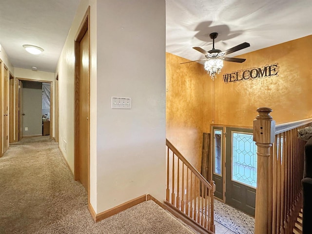 hall featuring carpet floors