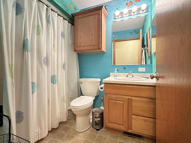 bathroom with walk in shower, toilet, and vanity