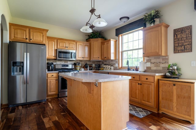 kitchen with a kitchen island, stainless steel appliances, dark hardwood / wood-style floors, and tasteful backsplash