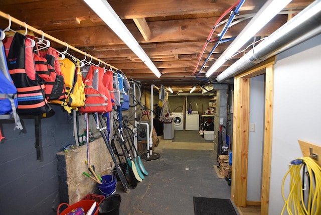 basement with washing machine and clothes dryer