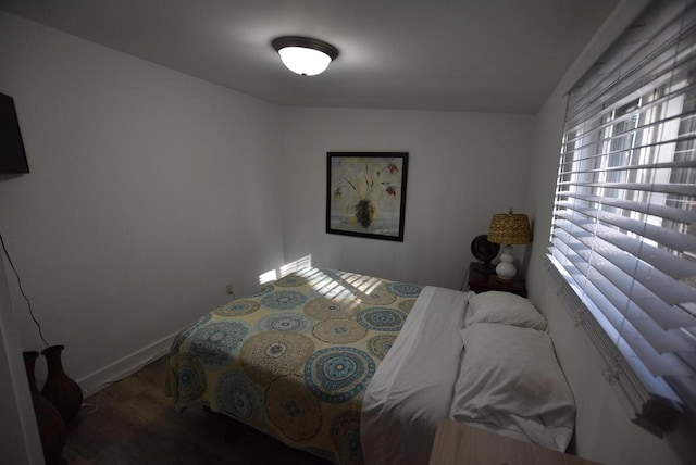 bedroom featuring hardwood / wood-style flooring