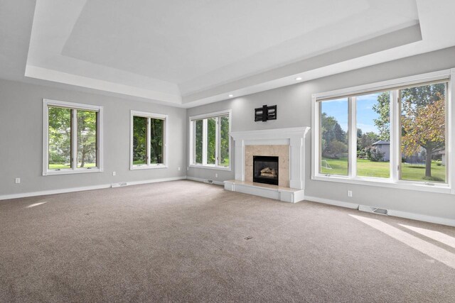 entryway with a healthy amount of sunlight, a notable chandelier, hardwood / wood-style floors, and high vaulted ceiling