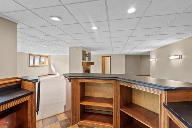 kitchen with a paneled ceiling