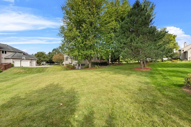 view of yard featuring a garage