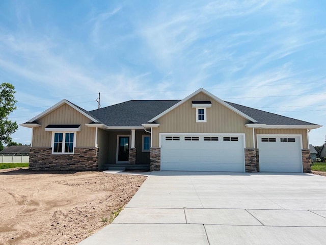 craftsman-style home with a garage