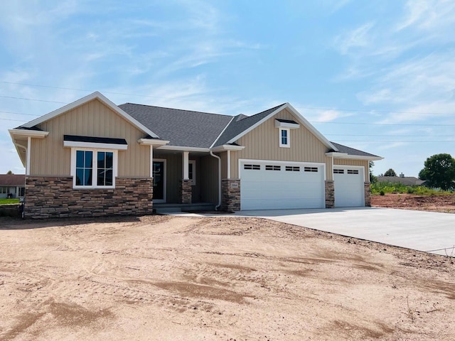 craftsman inspired home with a garage