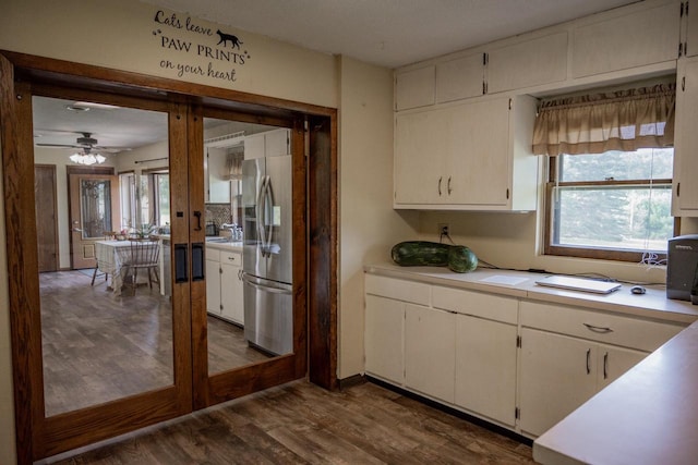 kitchen with dark hardwood / wood-style flooring, ceiling fan, stainless steel fridge with ice dispenser, french doors, and white cabinets