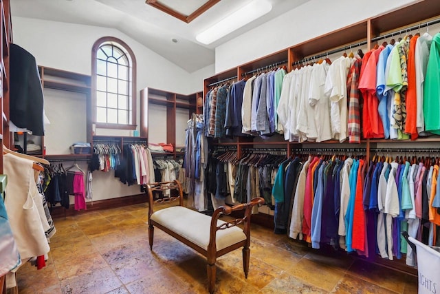 spacious closet with vaulted ceiling