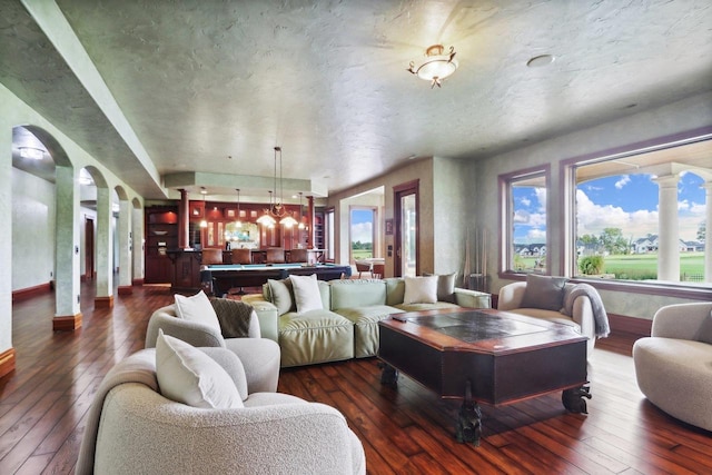 living room featuring dark hardwood / wood-style floors