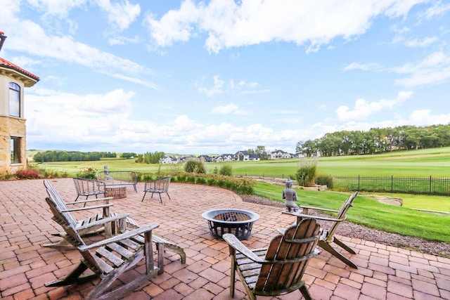 view of patio featuring a fire pit