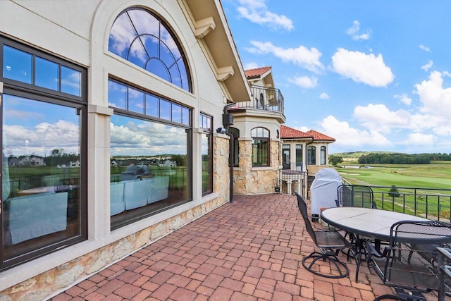 view of patio / terrace featuring a balcony