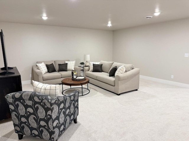 living room with light carpet, recessed lighting, and baseboards