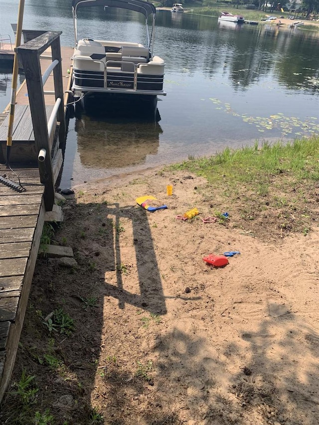 dock area featuring a water view