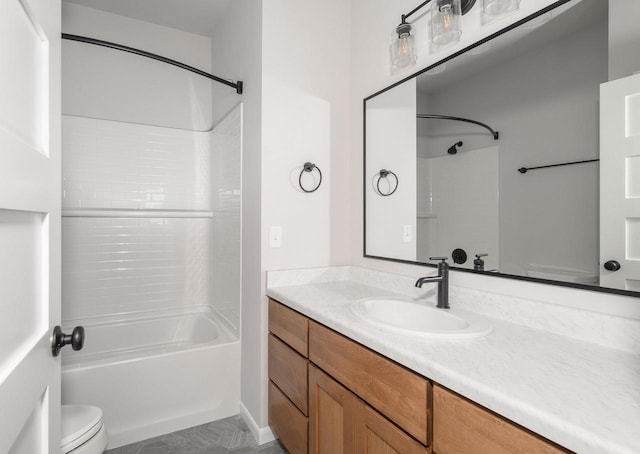 full bathroom featuring bathtub / shower combination, vanity, and toilet