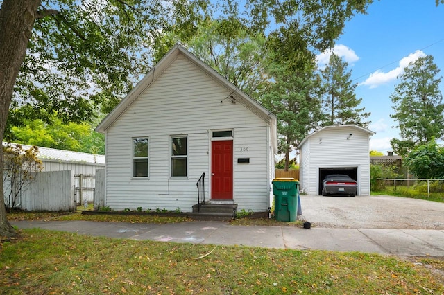 bungalow featuring a carport and a front lawn