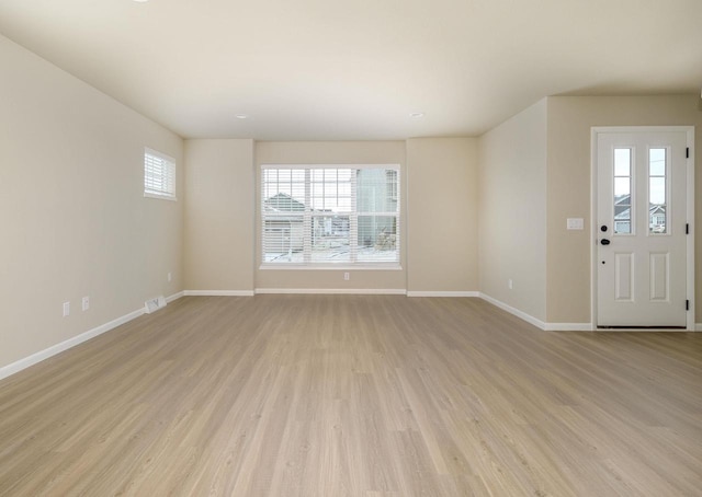 entrance foyer featuring light hardwood / wood-style floors