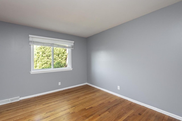 empty room with light wood-type flooring