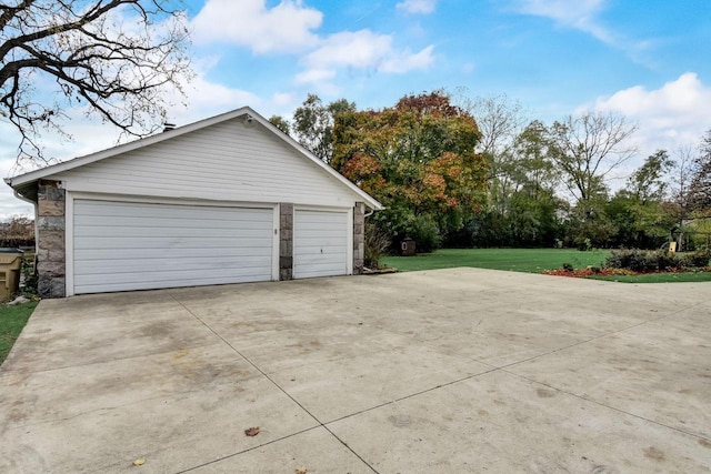 garage with a yard