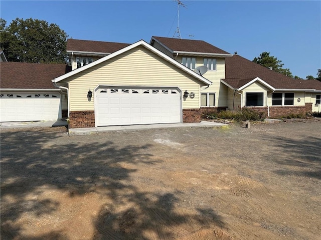 view of front of property featuring a garage