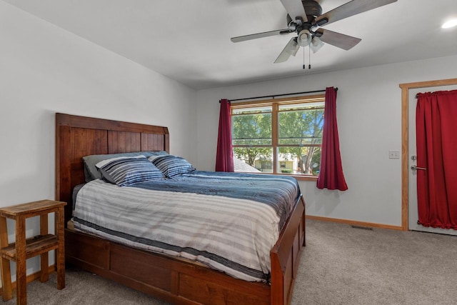 carpeted bedroom featuring ceiling fan