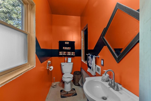 bathroom featuring sink and toilet