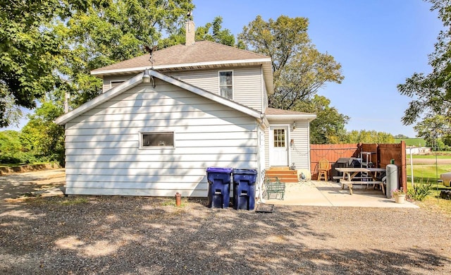 rear view of property with a patio