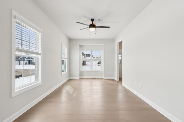 521 N Stone Ridge Dr, Lake Geneva, WI 53147 - empty room featuring ceiling fan and wood finished floors