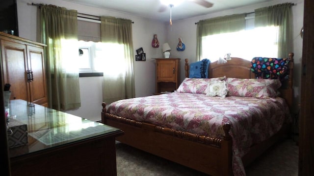 bedroom featuring ceiling fan and carpet floors