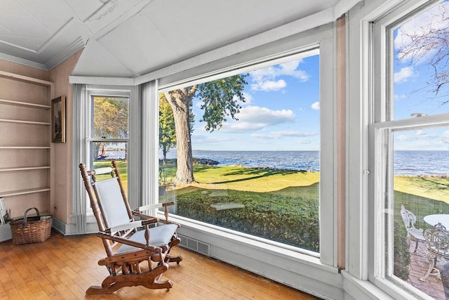 3790 Pau Ko Tuk Ln, Oshkosh, WI 54902 - sitting room with a water view, wood-type flooring, and crown molding