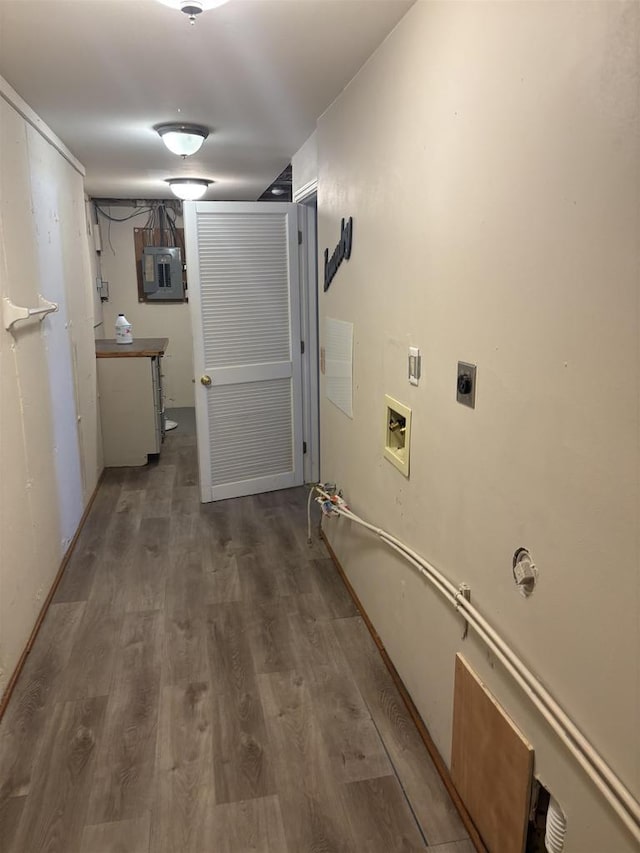 washroom with hookup for a washing machine and dark hardwood / wood-style floors