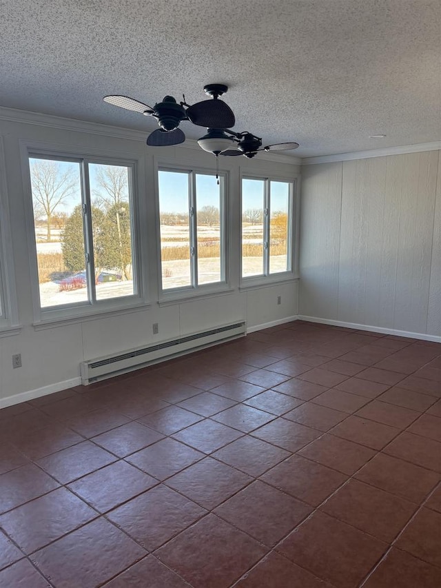 unfurnished room with a baseboard radiator, tile patterned floors, and ceiling fan