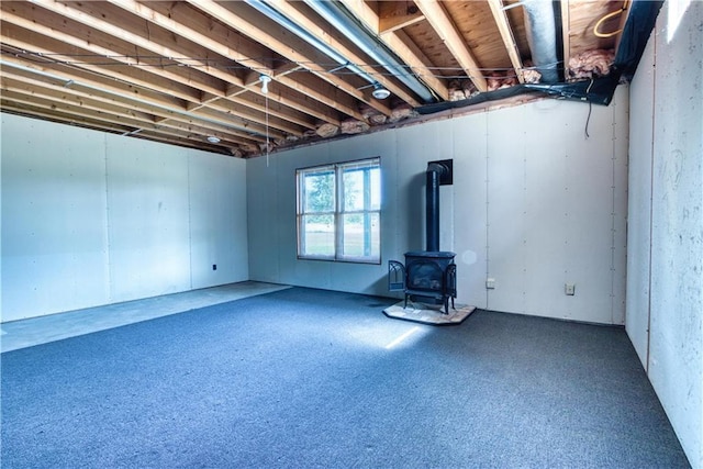 9018N Anderson Rd, Hayward, WI 54843 - basement featuring a wood stove