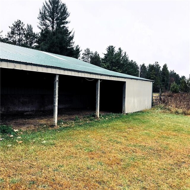 9018N Anderson Rd, Hayward, WI 54843 - view of pole building featuring a lawn