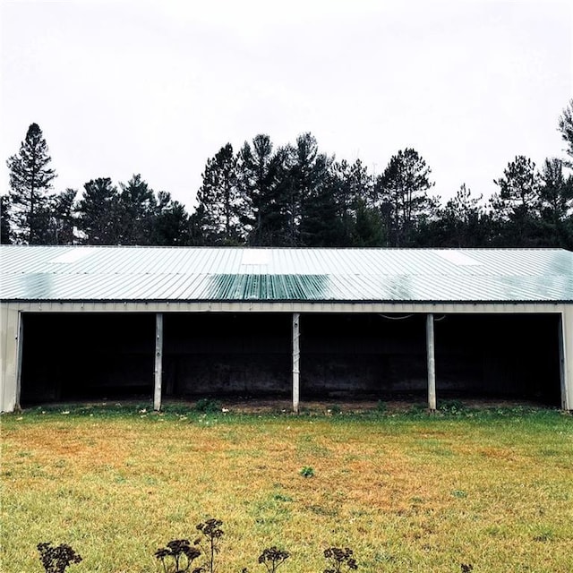 9018N Anderson Rd, Hayward, WI 54843 - view of pole building featuring a yard
