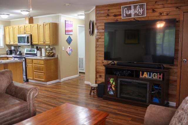 interior space with crown molding and dark wood-type flooring