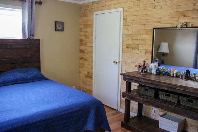 bedroom featuring dark wood-type flooring