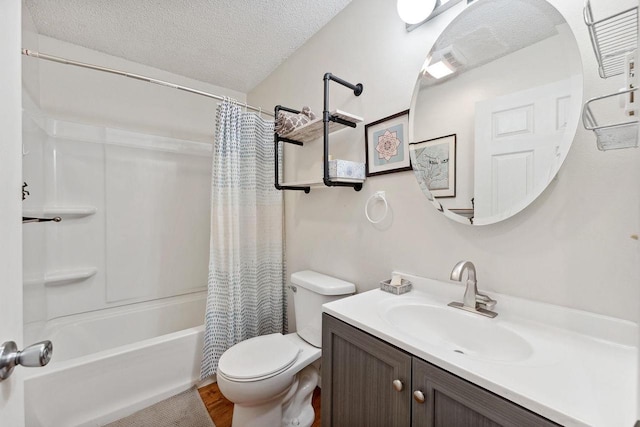 full bathroom featuring a textured ceiling, vanity, toilet, hardwood / wood-style flooring, and shower / bath combo