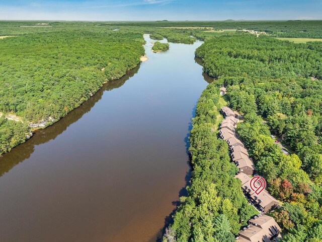 birds eye view of property with a water view and a rural view